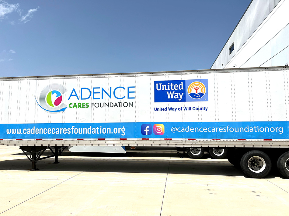 Trailer with Cadence Cares and United Way of Will County logos